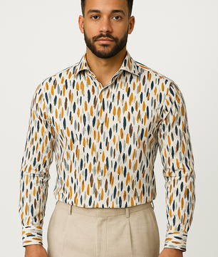 A man wearing a long-sleeved men's floral cotton cardigan shirt in a geometric pattern with a pointed collar.